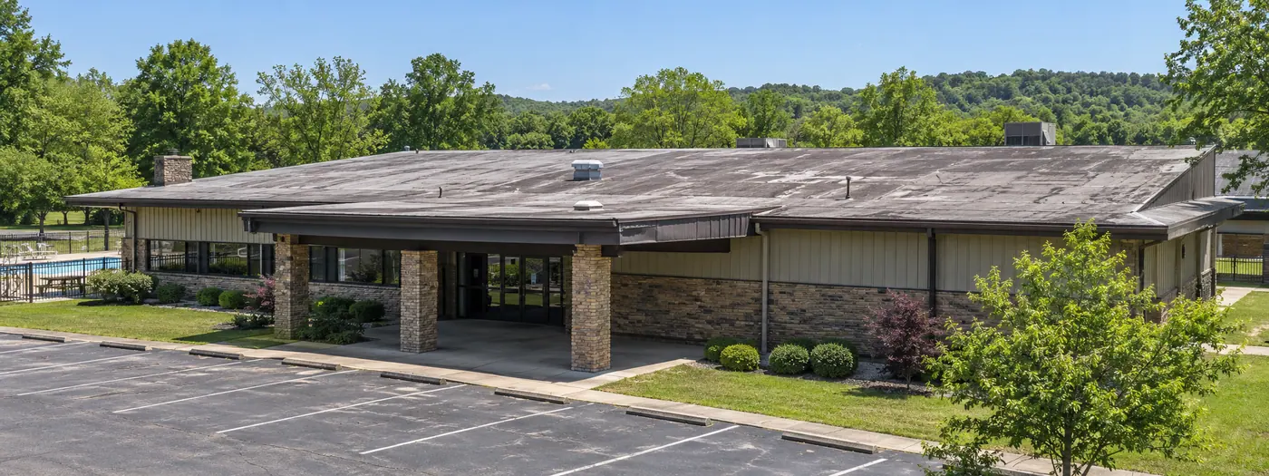 Row of commercial buildings with metal roofs